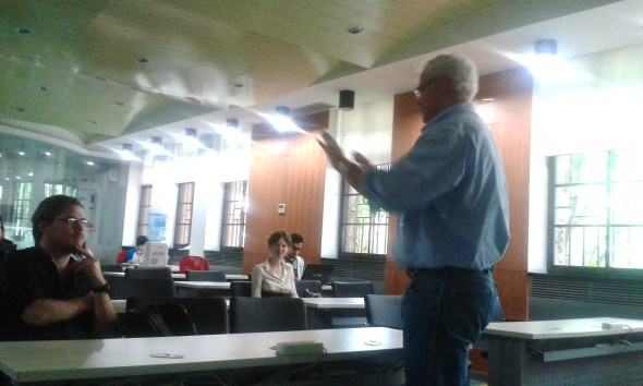 Matt Haldane has a front row seat for Larry Price's lecture at Tsinghua.