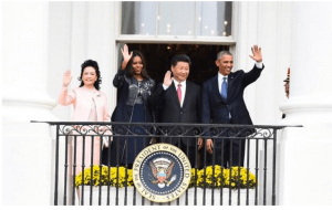 The first families wave from the Truman Balcony at the White House.